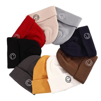 China JOINT Cheap Hats With Logo Smile Face Winter Beannie Custom Men Women Knitted Arctic Cap Winter Hats for sale