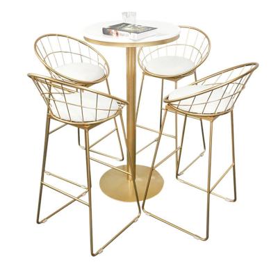 China Unique Light Luxury Design Metal Frame Dining Table And Chairs Set Dining Room Furniture for sale