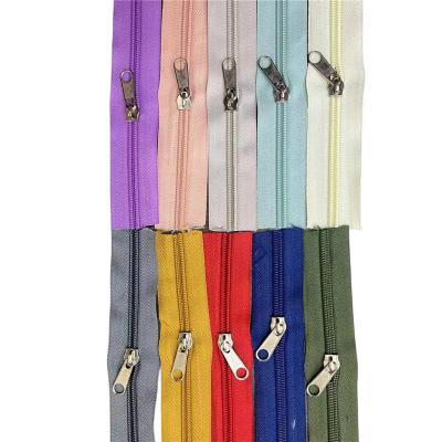 China Wholesale High Quality Color Pants Accessories 5# Automatic Lock Garment Zipper Invisible Nylon Tape For Clothes for sale