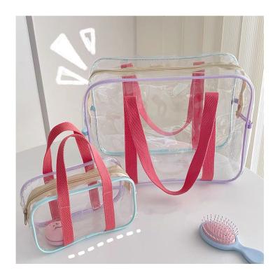 China Fashion Cheap Cream Color Large Capacity Transparent Bag Waterproof Clear PVC Beach Bag Shoulder Storage Wash Bag for sale