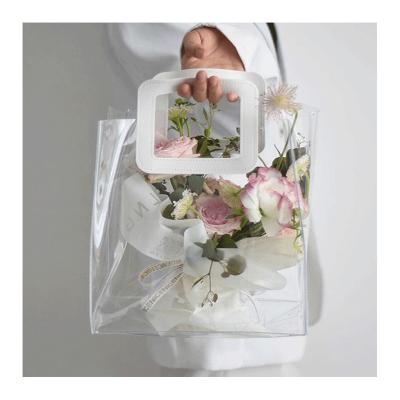 China 2022 Fashion Summer Handbag Transparent Luxury Jelly Bags PVC Tote Beach Bag Waterproof Small Boutique Handbags For Wedding Gift Flower for sale