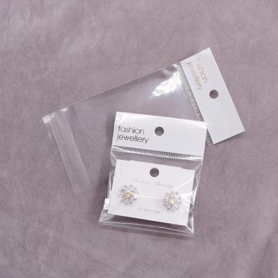 China Disposable Customized Small Opp Plastic Self-adhesive Clear Bag Jewelry Gift Earrings Packaging Pouch Bags With Hook For Jewelry for sale