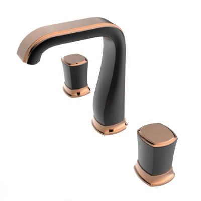 China Modern Luxury Split Deck Mounted Brass Hot Cold Water Faucet Mixed Three Hole Two Handle Black Rose Gold Bathroom Basin Faucet for sale