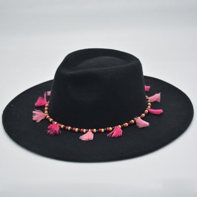 China Autumn/Winter Tassel Decoration Luxury Wide Brim Felt Panama Hat Polyester Fedora Hats for sale