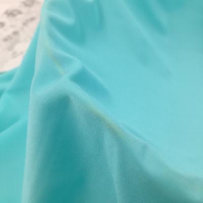 China Latest Design New Arrival Functional Stretch Swimwear Fabric Nylon Cold Ice Silk Fabric for sale