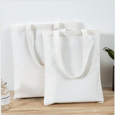 China Eco-friendly Wholesale Low MOQ Eco Friendly Shopping Bag Recycled Reusable Blank Plain Canvas Cotton Tote Bag With Custom Logo for sale