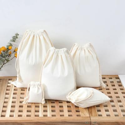 China Eco-friendly Eco Friendly Organic Muslin Cotton Pouch Promotional Small White Calico Cloth Canvas Drawstring Bag With Logo Printed for sale