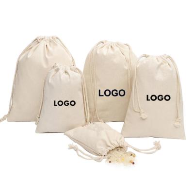 China Eco-friendly Good Quality Portable Reusable Printed Gift Canvas Cotton Calico Bag Drawstring Customised Christmas Drawstring Gift Bag for sale