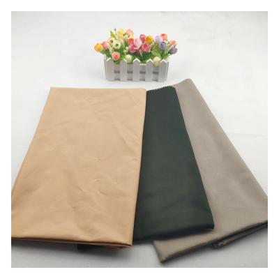 China Low Price Spandex Twill Fabric Moisture-Absorbent Spells Stock Low Price Shaoxing Fabric For Men's Pants And Shorts for sale