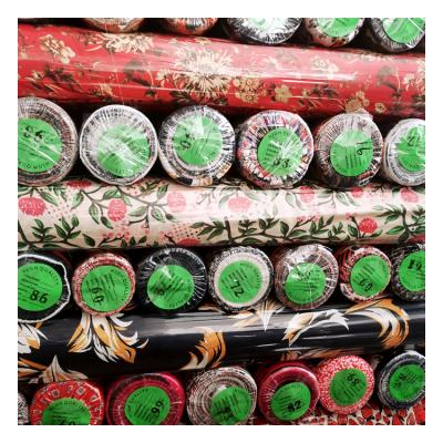 China Shaoxing QUICK DRY cheap price polyester silk fabric printed fabric stock lot for women's dress for sale