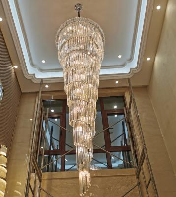 China Luxury Modern Hotel Lobby Decoration Rotating Long Pendant Light Classic Living Room Stairs Golden Hanging Crystal Chandeliers for sale