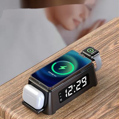 China Mobile Phone Top Selling 4 in 1 PC Multifunctional Fireproof Mother Alarm Clock Mobile Phone Wireless Charger for sale