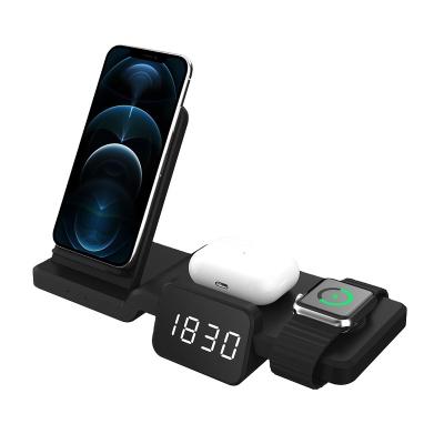 China Hot Selling Amazon Mobile Phone 5 in 1 Clock Charger Stand Cell Phone Wireless Charger 15W Radio Fast Charging for sale