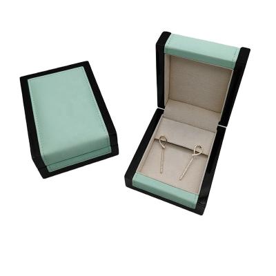 China Custom logo leather jewelry box highlight wooden gift box surface jewelry packaging box jewelry box for sale