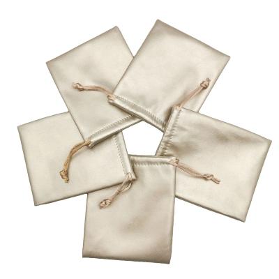 China Luxury Gold Leather Jewelry Packaging Pouches PU Jewelry Packaging Pouches For Earring Ring Ready To ship for sale