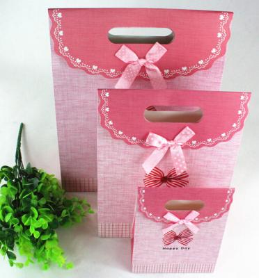 China sell paper shopping bag,paper bag,gift bag,shopping bag,cloth paper bag,sugar paper bag for sale