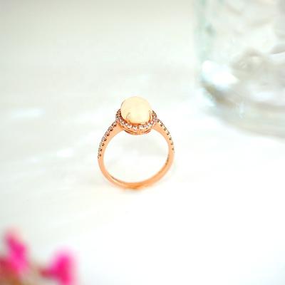 China 100% Lead Free Oval Halo Nature Nickel Straight Leg Opal Women Ring Anillos De Mujer 14K Rose Gold Diamonds Solid Engagement Ring For Bride for sale