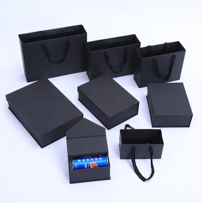 China Wholesale Cheap Recycled Luxury Art Paper Magnetic Closure Cardboard Packaging Materials Factory Black Gift Box With Bag for sale