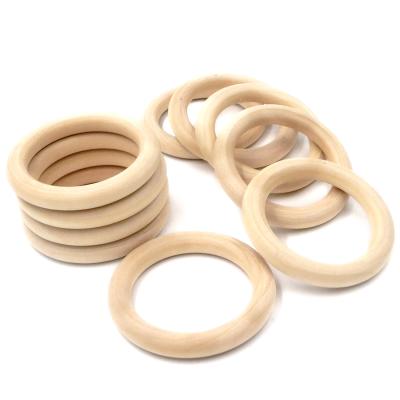 China 25mm Eco-Friendly Nature Teething Toy Accessories Necklace Wooden Ring Organic Infant Baby Teether Montessori Teether for sale