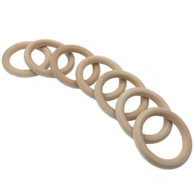 China 40mm Eco-Friendly Nature Teething Toy Accessories Necklace Wooden Ring Organic Infant Baby Teether Montessori Teether for sale