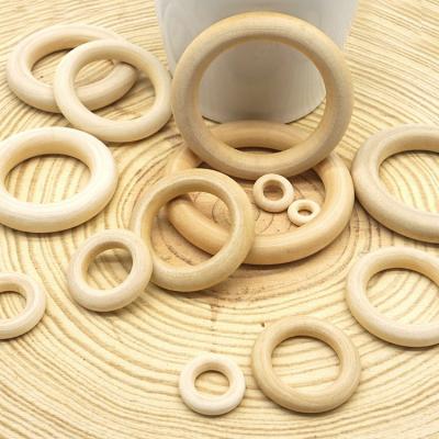 China 45mm Eco-Friendly Nature Teething Toy Accessories Necklace Wooden Ring Organic Infant Baby Teether Montessori Teether for sale