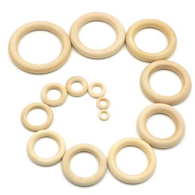 China 50mm Eco-Friendly Nature Teething Toy Accessories Necklace Wooden Ring Organic Infant Baby Teether Montessori Teether for sale