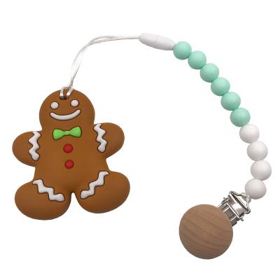 China Soft Toy Custom Pacifier Chain Teething Pain Relief Silicone Gingerbread Man Holder and Pacifier Clip for Trendy Boy or Girl for sale