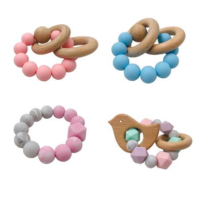 China Soft Toy Boy Girl Products Silicone Teething Bracelet Dummy Baby Funny Shower Gift for sale