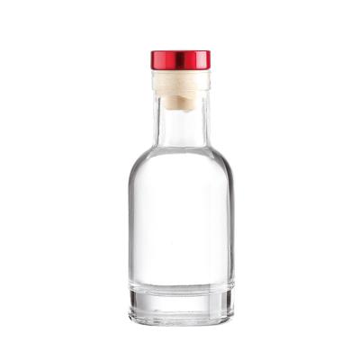 China Hot Stamping 100 ml 120 ml Glasflasche für Wodka Gin Whisky Oberflächenbehandlung zu verkaufen