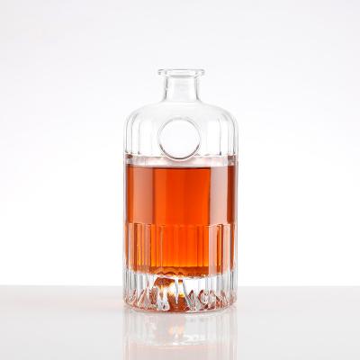 China Customize Sealing Type Empty Glass Round Bottle for Rum Whiskey in Bulk Supply for sale