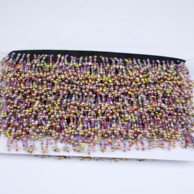 China Attractive Wholesale Plastic Chain And Colorful Beaded Fringe Trimming For National Dress for sale