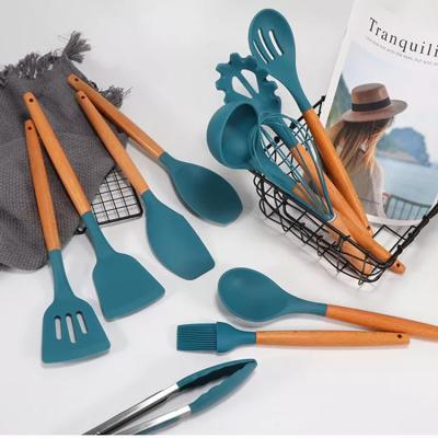 China Sustainable Top Selling Silicone Kitchen Utensil Set Cooking Tool Kit Of 11 With Wooden Handle for sale