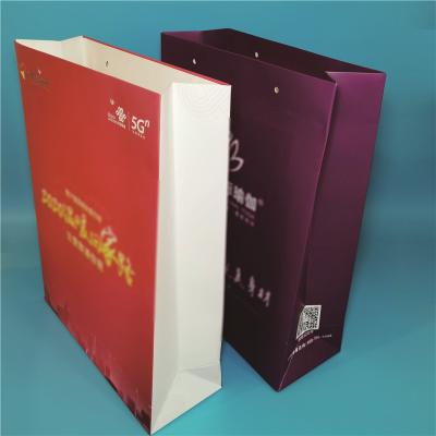 China Custom Size Eco Friendly Handle Paper Bags Paper Gift Bag Shopping Paper Bag for sale