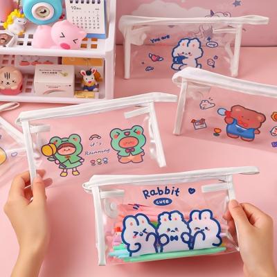 China Schools & INS transparent girl student storage bag portable large capacity pencil case makeup wash bag bear heart waterproof makeup bag for sale