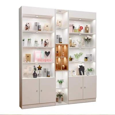 China MDF Black White Wood Tiered Shelf Cosmetic Display Cabinet Display Cabinet With Light for sale