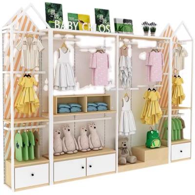 China Floor Display Cabinet Shelves Nakajima Commercial Display Rack Supermarket Multifunctional Baby Clothes Display Cabinet for sale