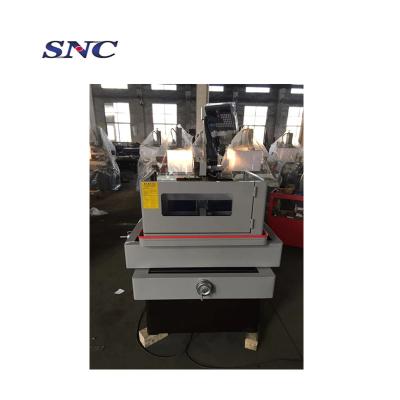 China Multi Metal Cutting DK77 Series CNC Wire Cutting Wire Cut EDM Machine for sale