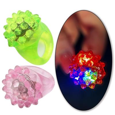 China Plastic Light up toys 3 led jelly bumpy rings Glow in the dark neon ring bumpy toy decorations for glow party favors for sale