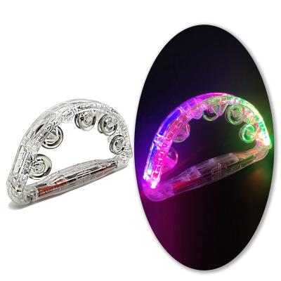 China Plastic Light up toys 4 Led tambourine handheld percussion instrument for kids and adults party toys for sale