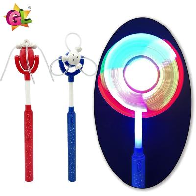 China Plastic Light up toys light up DIY fiber wand led changing pattern spinner wand electric lighted windmill toy for kids for sale