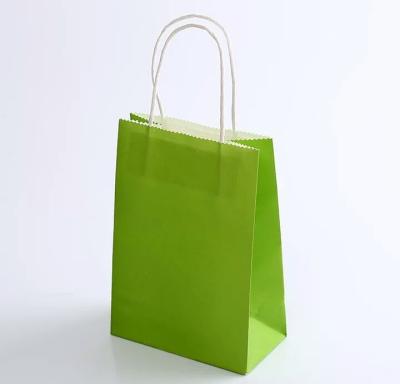 China Custom Luxury Gift Garment Paper Shopping Bags With Logo Print for sale