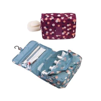 China Stock Brand Eco-friendly 210D Ripstop Material Cosmetic Bag With Flower Printing And Hanger Bag for sale