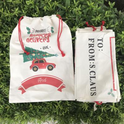 China Stock Wholesale Eco-Friendly 50cm x 70cm Large Santa Sacks Cotton Canvas Bags Merry Christmas Drawstring Gift Bag for sale