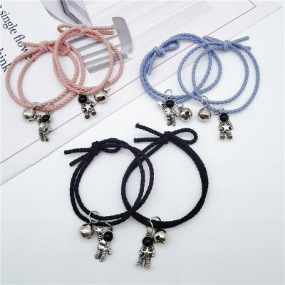 China Casual/Sporting A Pair Of Astronaut Bell Bracelets Astronaut Rope Hand Dangle Jewelry For Women Men for sale