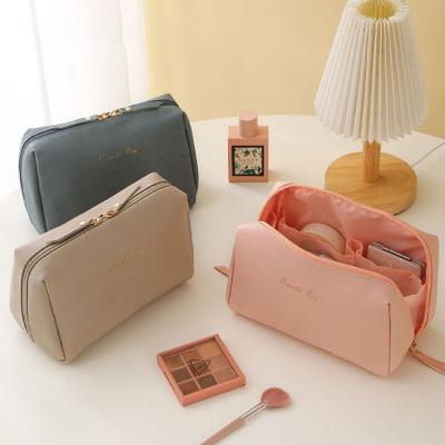 China Wholesale Travel Portable Makeup PU Mini Storage Wash Small Logo Fashion Custom Fashion Pocket Cosmetic Bag For Women for sale