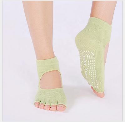 China Non-slip summer spring and toe sports backless yoga distributing five finger socks ladies short five toe socks with high quality for sale