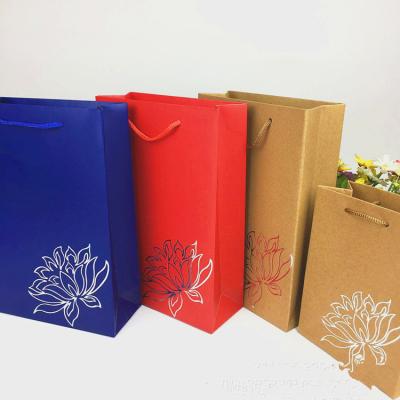 China El logotipo amistoso de los bolsos de compras del papel de Eco Kraft imprimió para la tienda/el supermercado en venta