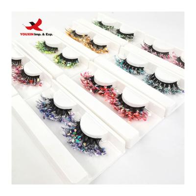 China FENGFLY Nice Appearance Glow False Eyelashes Trend New Festival Colors 3D Effect Classic Full Glitter Colored Eyelash Natural Strip False Eyelashes With Packing for sale