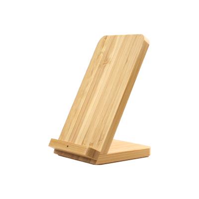 China 2022 New Phone Charger Stand 10W Dual Wireless Bamboo Wireless Charger Coil Eco-Friendly Bamboo Phone Holder Stand for sale