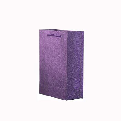 China Unique Disposable PP Bags For Gift Shopping Glitter Solid Color Plastic Bag With Handles Package for sale